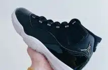 person wearing black nike running shoe