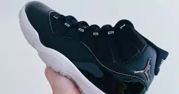 person wearing black nike running shoe