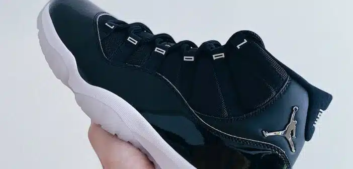 person wearing black nike running shoe